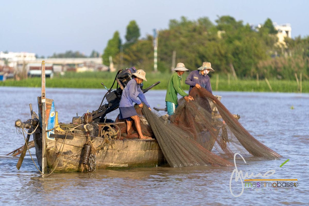 Pescatori nel Delta del Mekong